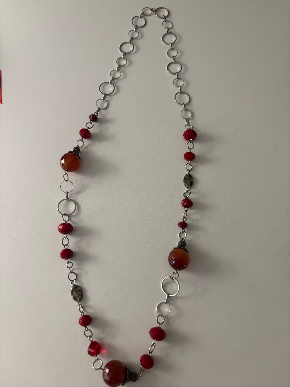 Long silver-tone link chain